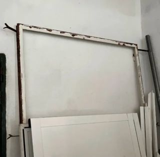 Puerta doble hierro con cristales y marco