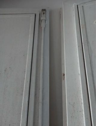 Puerta doble hierro con cristales y marco