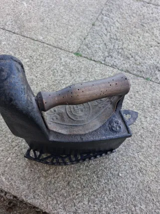 Plancha de carbón antigua