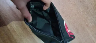 Estuche ripcurl Negro y Rojo