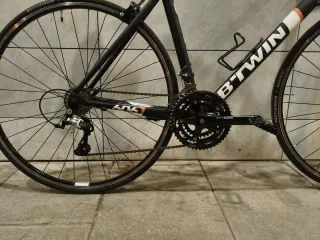 BICICLETA CARRETERA BTWIN TRIBAN 500