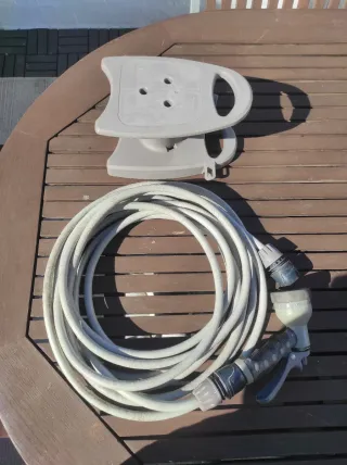 Manguera 10m con soporte y alcachofa