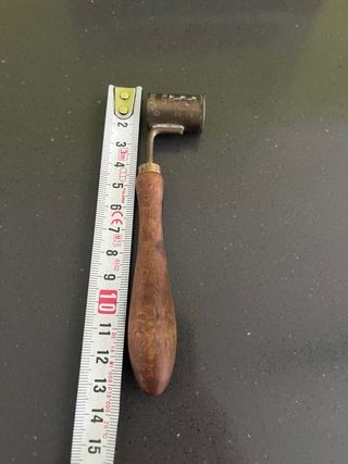 Antiguo medidor de pólvora