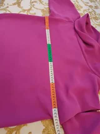 Traje de fiesta Purificación García fucsia.