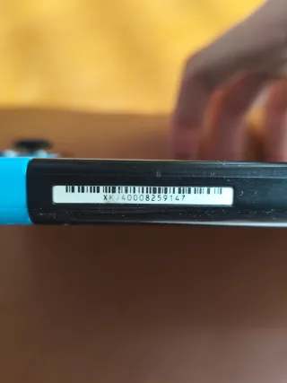 Nintendo Switch V2 Azul/Rojo + Super Smash Bros