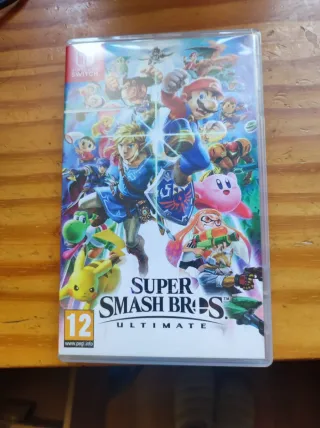 Nintendo Switch V2 Azul/Rojo + Super Smash Bros