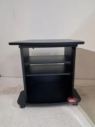 Mueble TV giratorio negro con puerta cristal