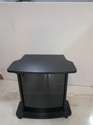 Mueble TV giratorio negro con puerta cristal