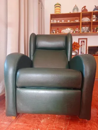 Sillón reclinable de piel verde