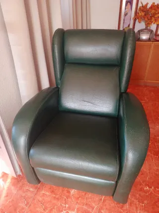Sillón reclinable de piel verde