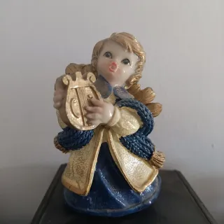 Angioletto con lira decorativo