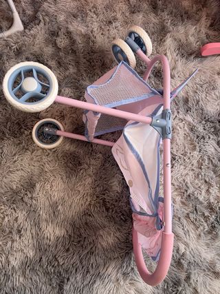 Carrito de muñecas rosa con diseño de gimnasta