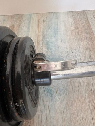 Barra de musculación con discos