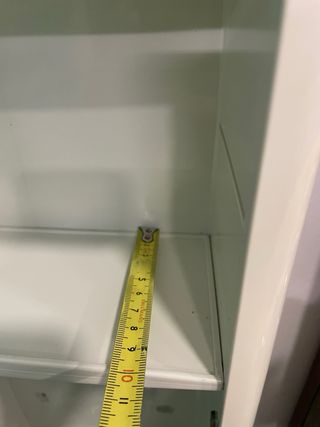 Armario de baño verde y blanco