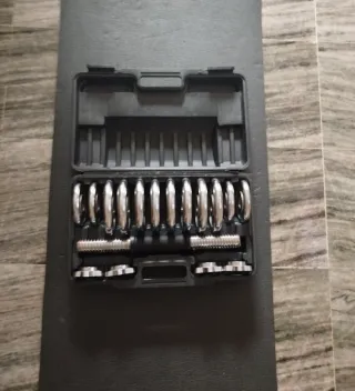 Maletín de pesas ajustables