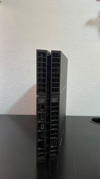 Consola PS4 + 12 Juegos y 2 Mandos