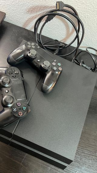 Consola PS4 + 12 Juegos y 2 Mandos