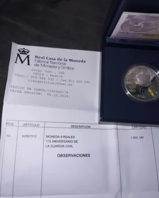 Monedas de oro y plata con certificados