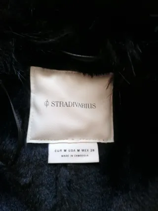 Abrigo negro con pelo