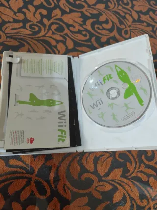 Consola Wii + Wii Fit + plataforma y accesorios