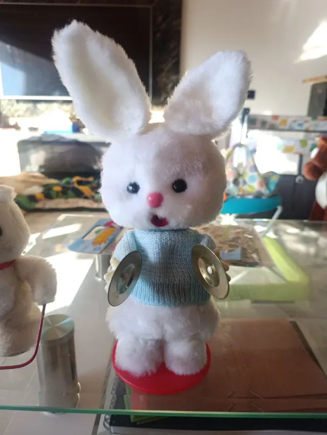 Osito saltarín saltacomba-conejo pandereta