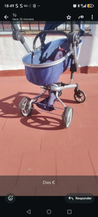 Carro de paseo para muñecas azul