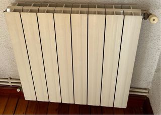 7 radiatori in metallo bianchi