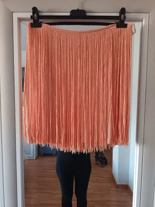 Falda corta con flecos