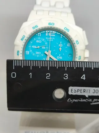 Reloj Swatch Blanco y Turquesa