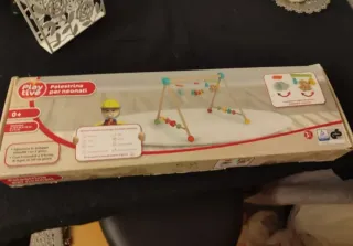 Gimnasio de madera para bebé