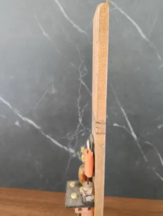 Figura decorativa artesanal con poema