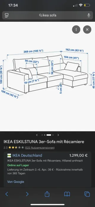 Sofá modular gris con cojines amarillos