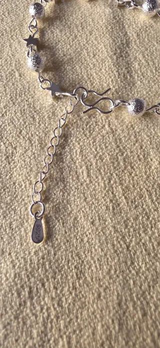 Pulsera de plata con estrellas