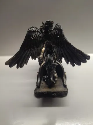 Scultura in metallo: angelo, cavalli e carro