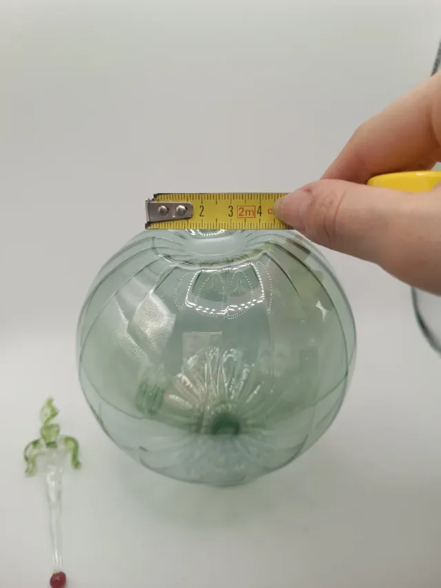 Bottiglietta tonda in vetro verde