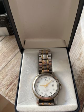 Reloj Lotus Oro y Plata