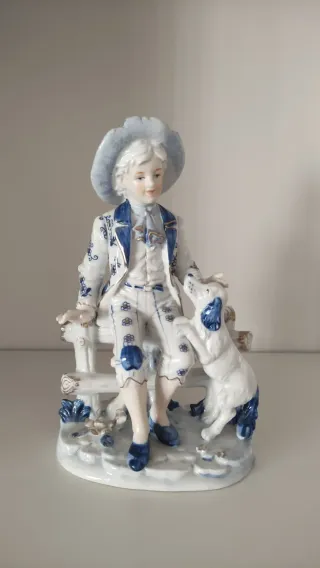 Pareja figuras porcelana con perros