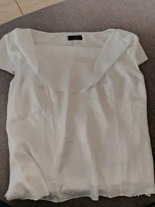 Ropa variada de marca casi sin uso