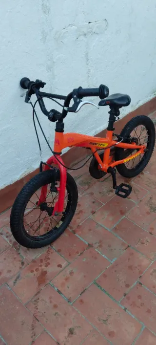 Monty 103 Naranja +  Patinete ruedas led + Casco