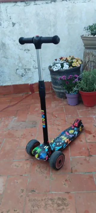 Monty 103 Naranja +  Patinete ruedas led + Casco