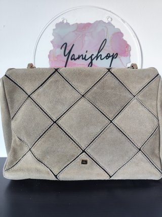 Bolso Purificación García flecos y cadena