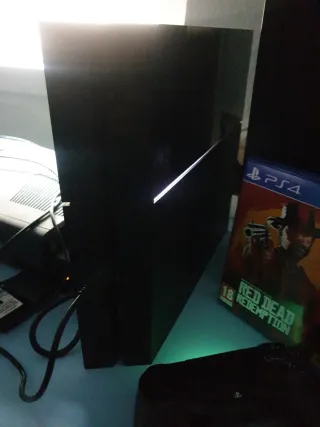 PS4 500GB + Mando + Red Dead Redemption 2
