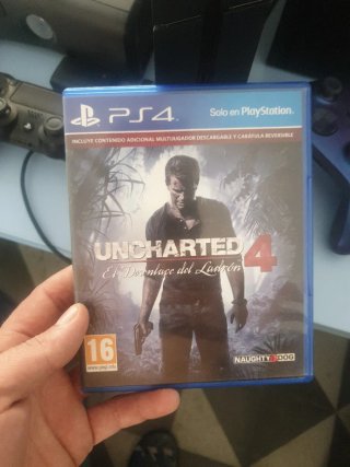 PS4  + Mando + uncharted 4 negociable