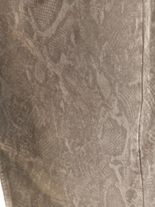 Vaqueros anchos negros animal print Talla S