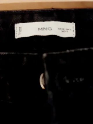 Vaqueros anchos negros animal print Talla S