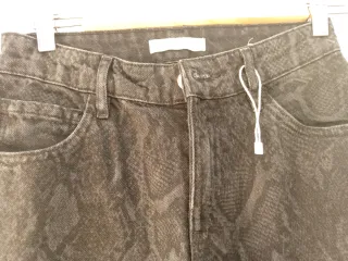 Vaqueros anchos negros animal print Talla S