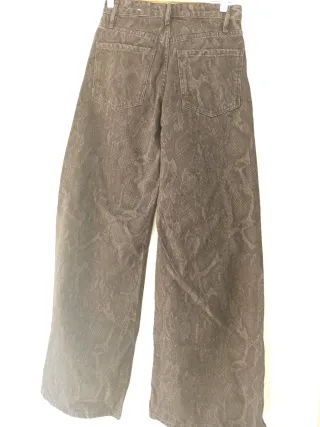 Vaqueros anchos negros animal print Talla S