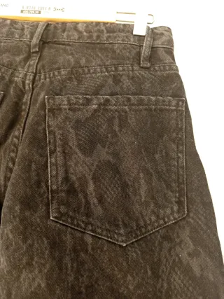 Vaqueros anchos negros animal print Talla S