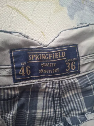 Bermudas multibolsillos azul marino y blanco