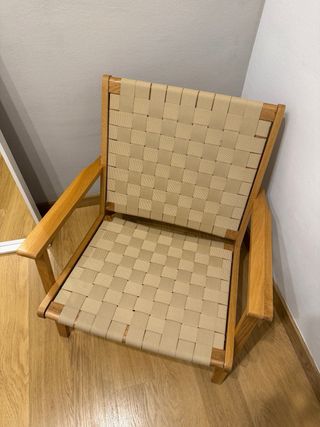 Poltrona in legno e rattan intrecciato